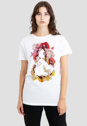 White cotton t-shirt featuring a colorful illustration centered on a figure with floral accents in shades of red, pink, and yellow.