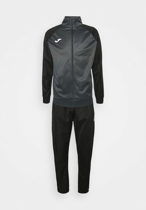 Track suit featuring a dark gray zip-up jacket with black sleeves and matching black pants, made of smooth polyester material.