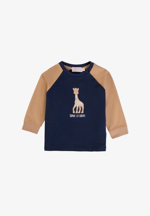 Marineblaue Langarmshirt mit beige Raglanärmeln, das ein Giraffenmotiv und den Text "SOPHIE LA GIRAFFE" in Cremefarbe zeigt. Aus weichem Baumwollmaterial.