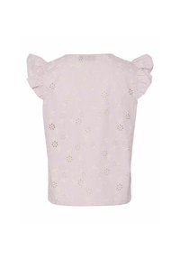 Blouse rose clair avec découpes florales ajourées et manches courtes à volants.