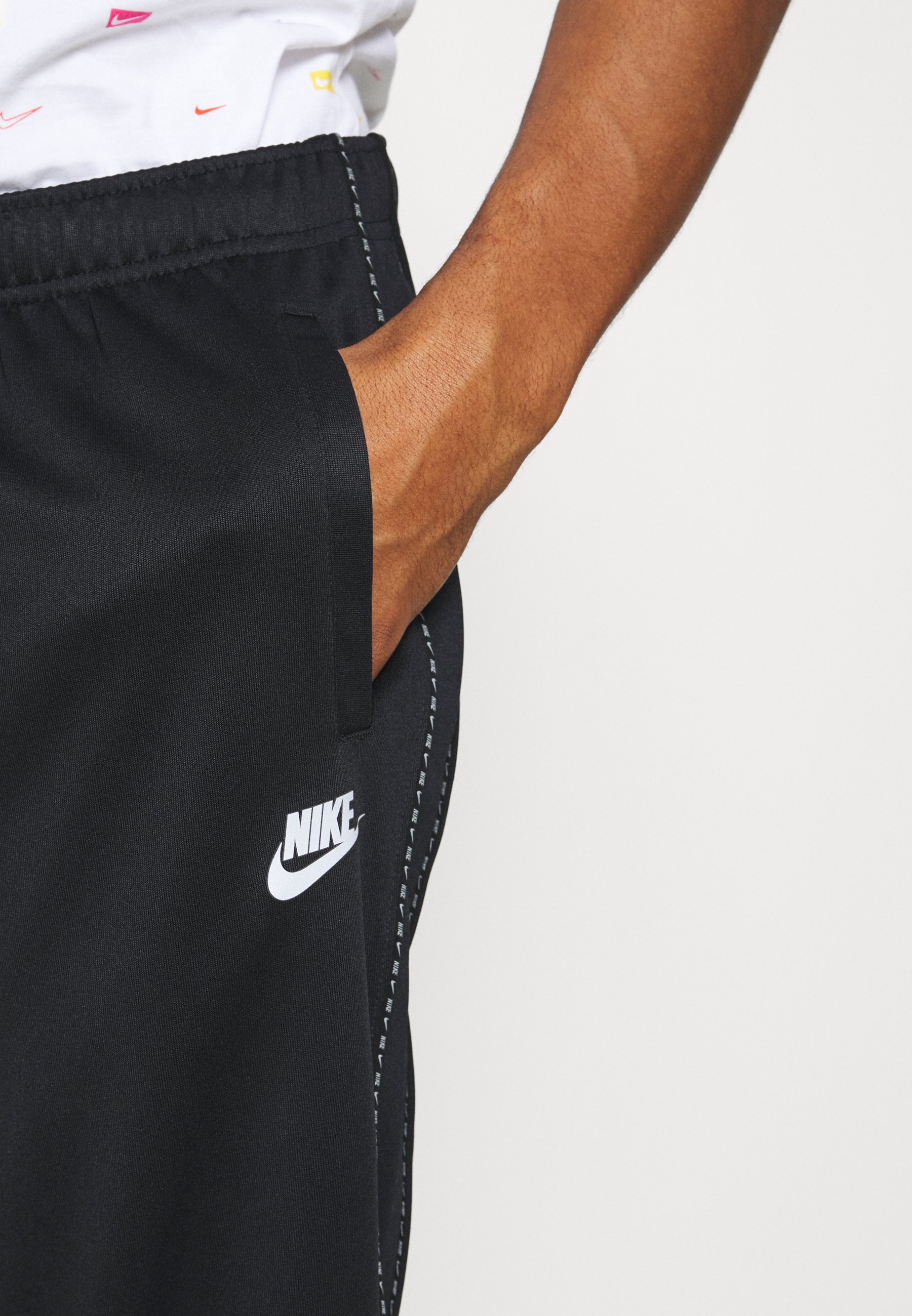 silver nike tracksuit