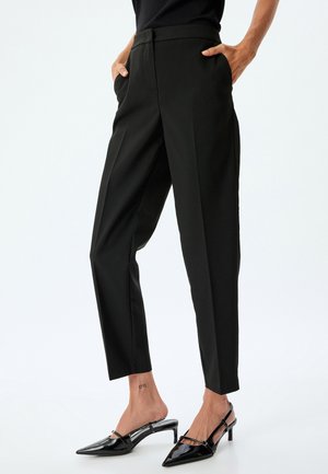 CIGARETTE  - Pantaloni - black