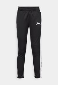 Zwarte sportbroeken met witte zijkanten, een elastische tailleband en een klein wit logo op de linkse heup. Glad textuur, aansluitend ontwerp.