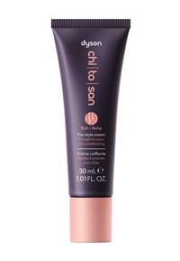 Tubo di crema pre-styling Dyson Chi To San Rich con corpo viola e tappo rosa, 30 ml, per il condizionamento di capelli da lisci a ondulati.