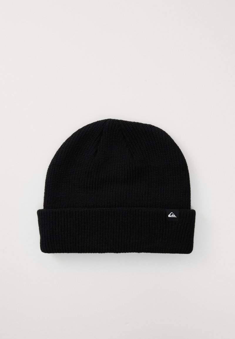 Black knitted beanie with a folded cuff, featuring a small white logo patch. The texture is ribbed, providing stretch and warmth.