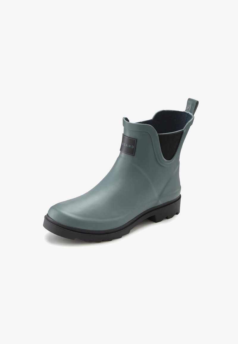Dark green rubber ankle boot with a textured finish, elastic side panels, and a black brand label on the front. Chunky black sole.