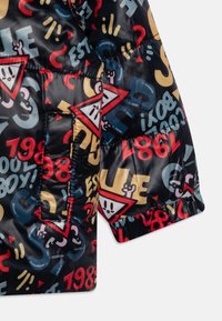 Guess BABY HOODED PADDED UNISEX - Vinterjacka - poppy punch blue