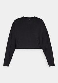 Zwarte katoenen crop top met lange mouwen, ronde hals en zachte textuur. Beschikt over een minimalistisch ontwerp zonder zichtbare patronen of accenten.