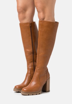 High heeled boots - cognac