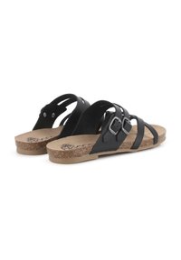 Sandalias negras con dos hebillas, plantilla de corcho y suela de goma. Diseño con tiras, textura suave y un ligero tacón.