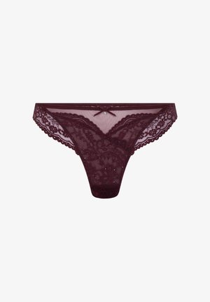 Tanga en dentelle bordeaux avec des motifs floraux, des bords festonnés et un petit nœud à l'avant avec un accent en bijou.