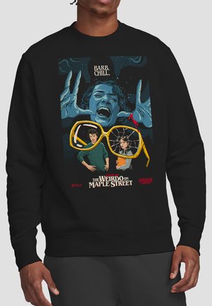 Blue-toned screaming face with bloodied hand above broken yellow glasses showing two standing characters, text referencing "The Weirdo on Maple Street."