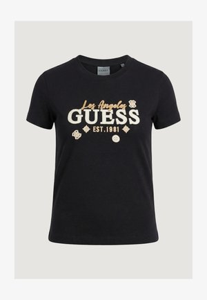 T-shirt nera a maniche corte con la scritta "Los Angeles GUESS EST. 1981" e toppe decorative beige sul davanti.