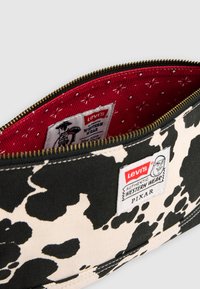 Levi's® TOY STORY COW POUCH - Vrecko na pranie - black/white