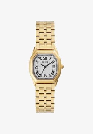 Gold-tone metal Fossil wristwatch with white octagonal face, black Roman numerals, and linked bracelet band, showing 10:09 time.