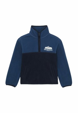 Predĺžená mikina z tmavomodrého flísu s polovičným zipsom, s tmavším námorníckym panelom vpredu, bočnými vreckami a bielym detailom loga hory.