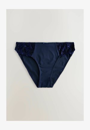 Sous-vêtements bleu marine avec des panneaux en dentelle transparente à motifs floraux, des bords festonnés et un tissu corporel lisse et uni.