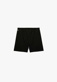 Zwarte sportshorts van lichtgewicht stof, met een elastische tailleband en een eenvoudig ontwerp zonder zichtbare patronen of accenten.