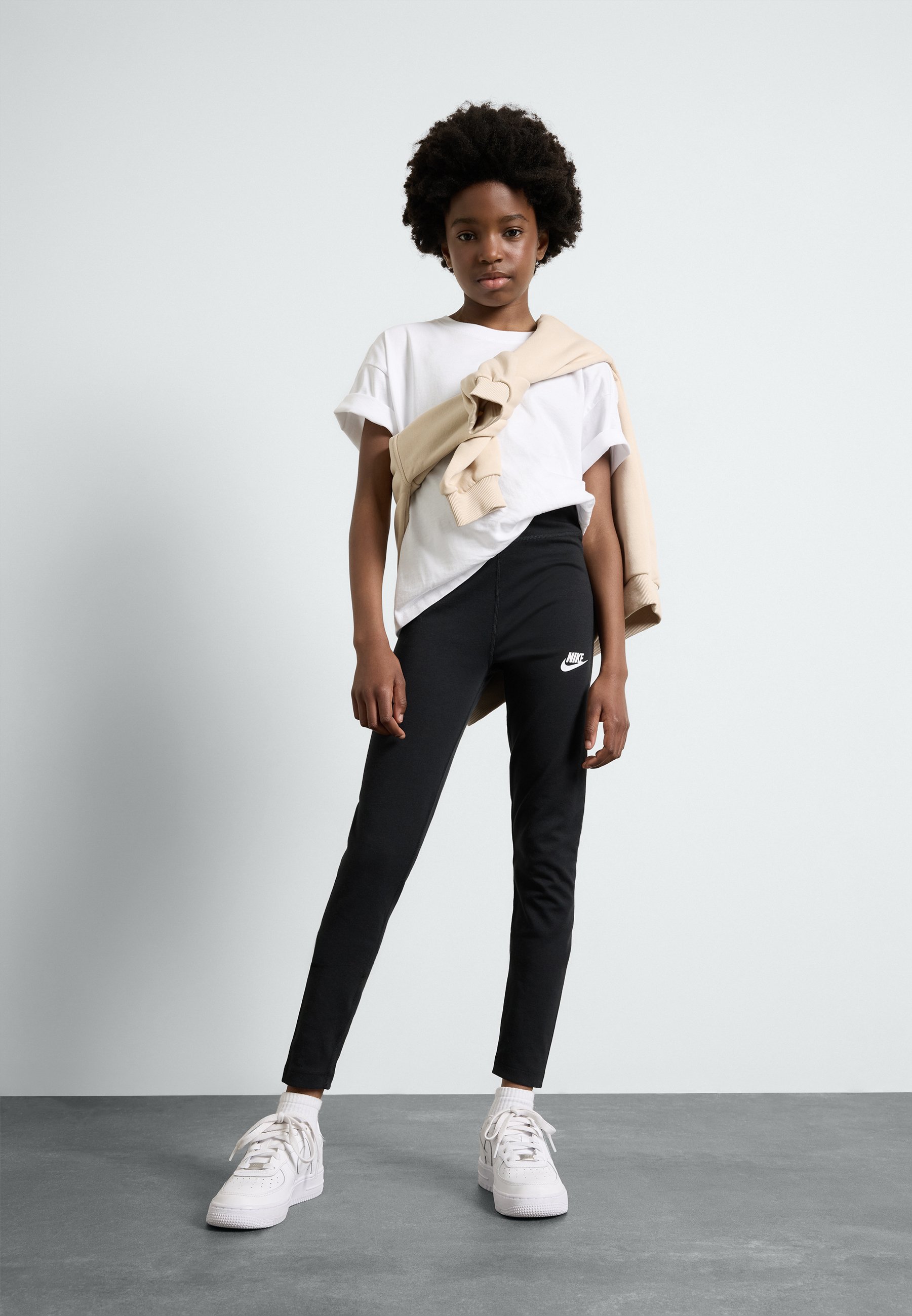 nike black leggings with white stripes