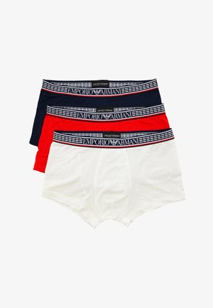 Three pairs of Emporio Armani boxer briefs in navy, red, and white. Each has a branded elastic waistband with a striped pattern.