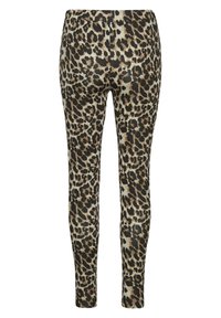 Legging s uzorkom leoparda s crnom pozadinom i smeškim i bež mrljama, visoki struk i rastezljivi materijal za udobnost.