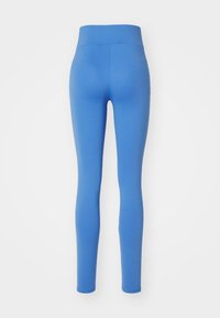 Leggings albastre cu talie înaltă, fabricate dintr-un material neted și elastic. Prezintă un design ajustat și o culoare solidă, fără modele.