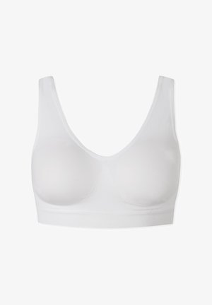 Valkoinen rintaliivit saumattomalla designilla, pehmeä materiaali ja leveät hihnat. Varustettu muotoilluilla kuppeilla ja sileällä teksturoidulla vyötäröosalla.