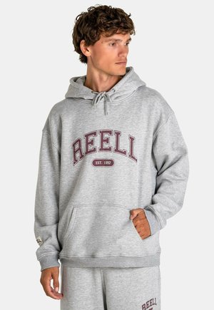 Gray hooded sweatshirt with a front pocket, featuring "REELL" in burgundy letters and "EST. 1997." Ribbed cuffs and hem. Soft texture.
