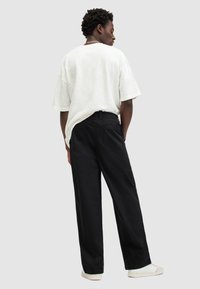 AllSaints JOVI - Stoffhose - black