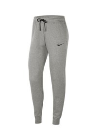 Pantalones deportivos grises hechos de una mezcla de algodón, con cintura elástica con cordón, puños acanalados y un detalle del logo de Nike en negro.