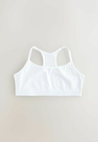 Valge spordirinnahoidja sileda tekstuuriga, reguleeritavate rihmade ja ristselja kujundusega. Alul küljel on peene brändingu bändid.