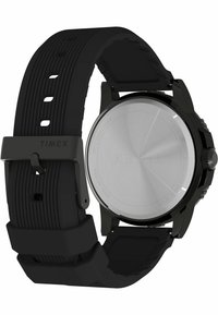 Orologio con cinturino in gomma nera e cassa in acciaio inossidabile; presenta un quadrante liscio e minimalista e un cinturino texturizzato per una presa migliore.