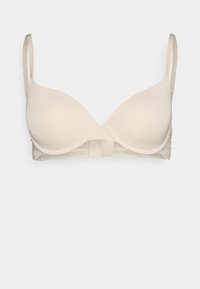 Soutien-gorge en beige rembourré avec bretelles réglables, design sans couture, finitions en dentelle au dos et fermeture à crochet et œillet. Texture lisse partout.