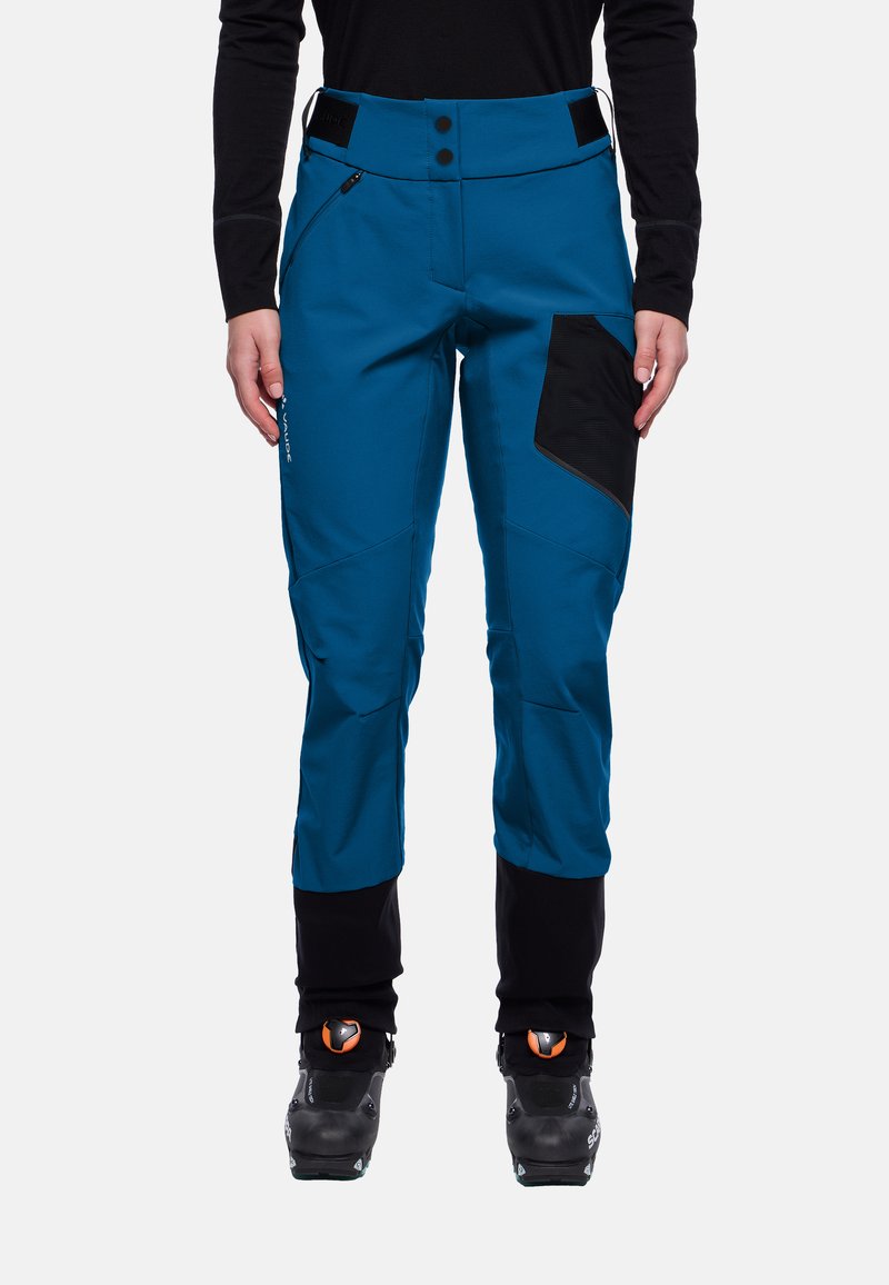 Blauwe skibroek met een zwart gestructureerd paneel, twee knopen in de taille, met rits afgesloten zakken en een taps toelopend ontwerp voor bewegingsvrijheid.