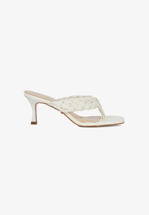 White high-heeled sandals with a braided upper strap, square toe, and a slim, angled heel, featuring a smooth, matte finish.