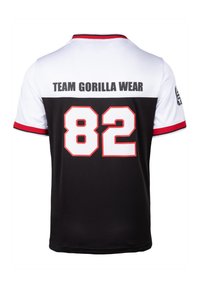 Camiseta atlética en blanco y negro con acentos rojos, que presenta "TEAM GORILLA WEAR" y el número "82" en negrita de color blanco en la parte trasera.