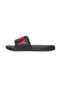 Chausson de bain noir avec une large sangle arborant une inscription "SUPERDRY" rouge audacieuse. Semelle en caoutchouc souple, texture lisse et design minimaliste.