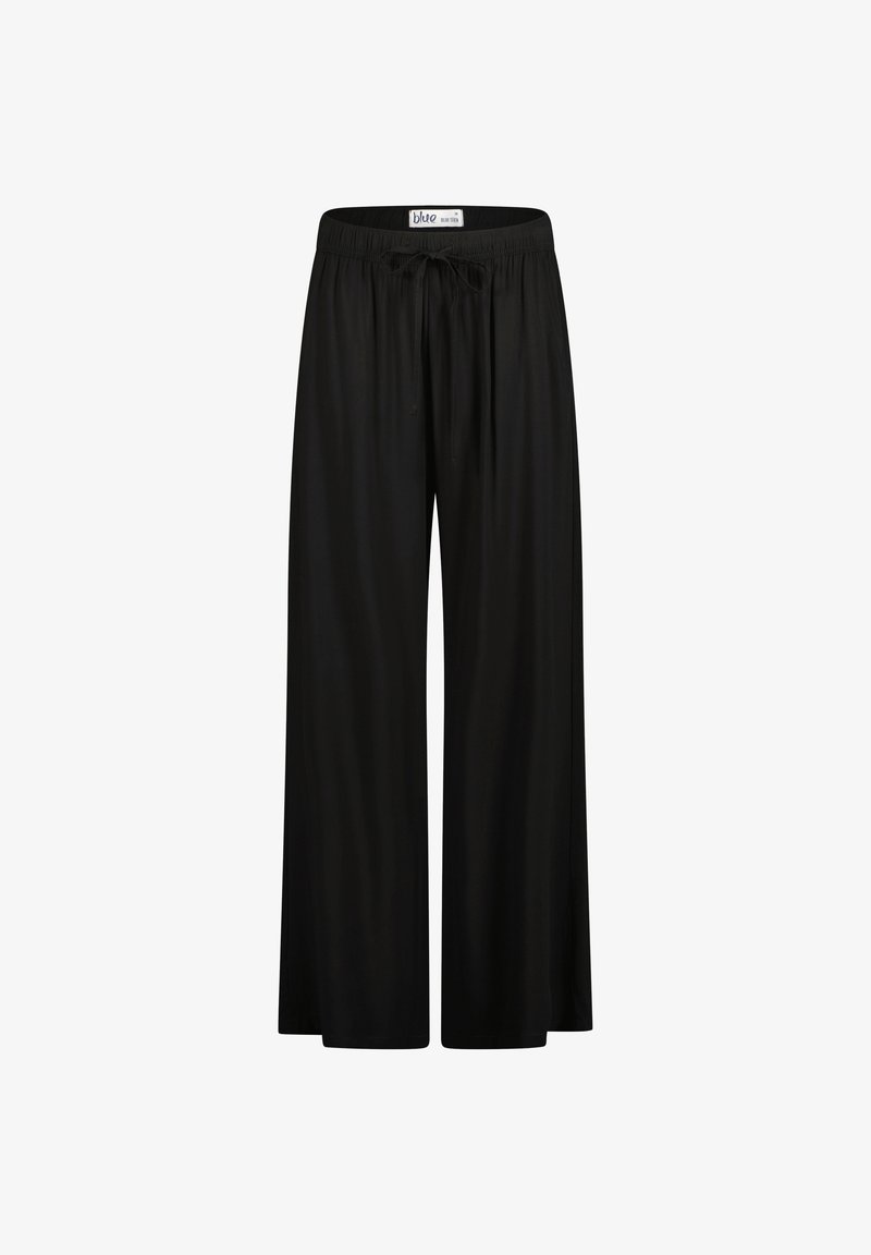 Pantalons larges noirs en tissu doux, avec une taille élastique et un cordon de serrage pour un ajustement réglable, et une texture lisse et fluide.