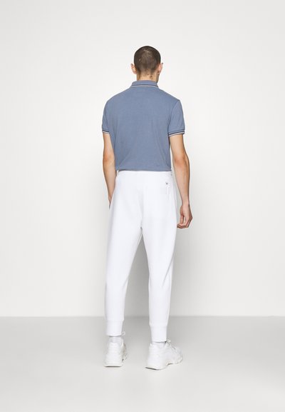 Emporio Armani TROUSER - Calças de fato de treino - bianco ottico