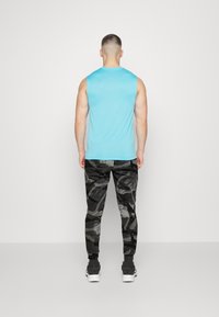 Nike Performance Jogginghose - black
