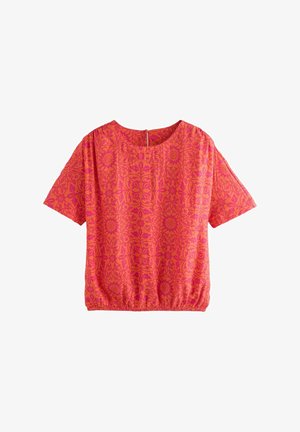 T-shirt à manches courtes en tissu rose vif avec un motif floral, doté d'une taille élastique et d'un col rond avec une fermeture éclair à l'arrière.