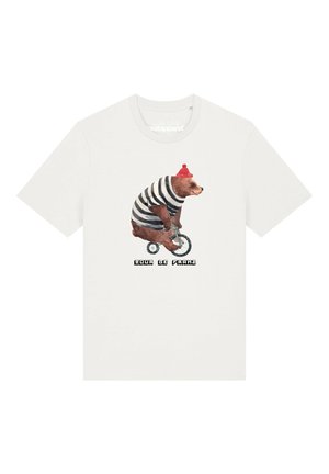 T-shirt avec une impression d'un ours brun portant une chemise rayée et un chapeau rouge, roulant à vélo sur un petit vélo avec le texte "Tour de Franz" en dessous.
