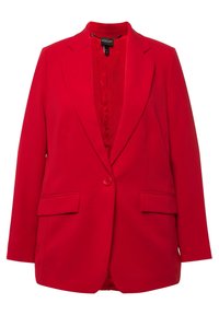 Blazer rouge à bouton unique avec revers crantés et poches à rabat, doté d'une doublure intérieure lisse et d'une coupe ajustée.