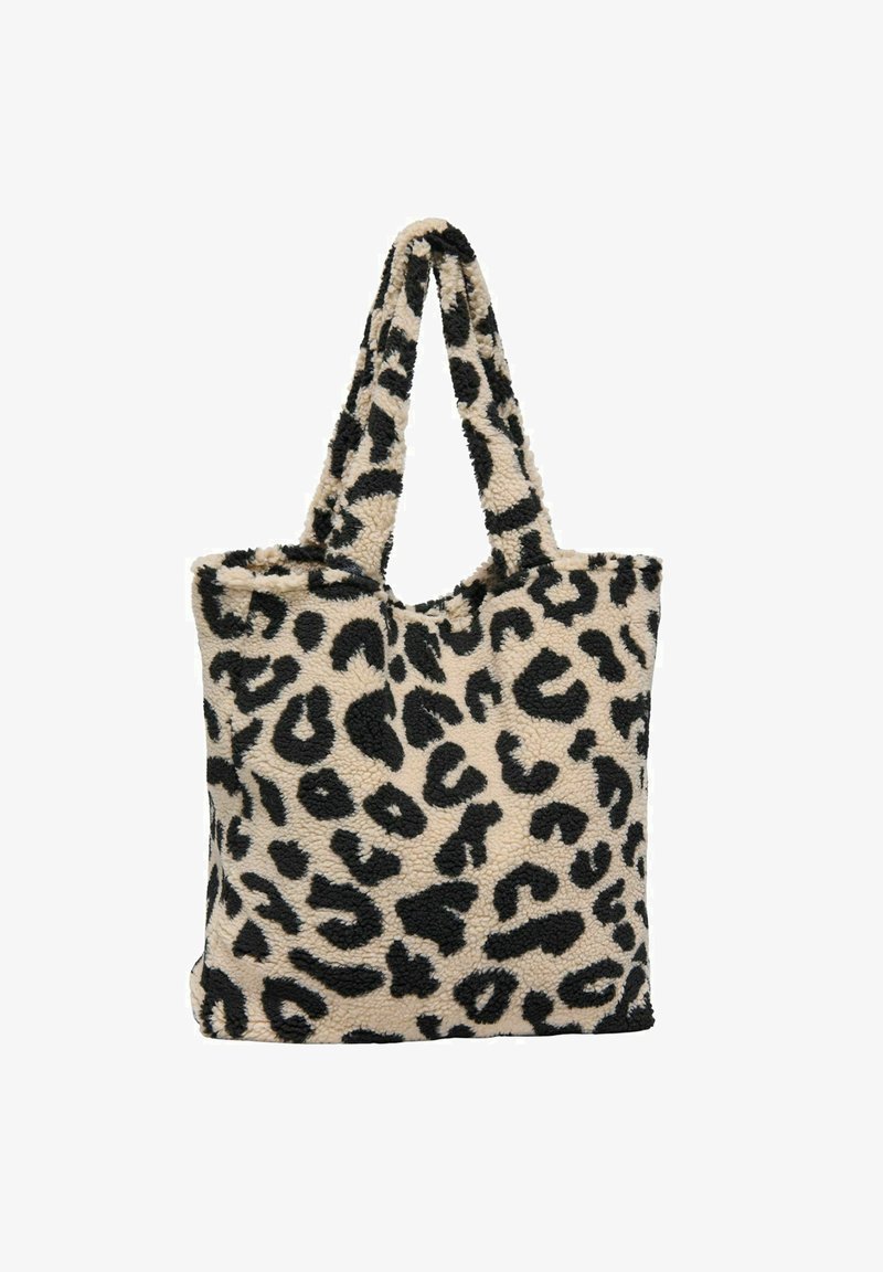 Tote torba s leopard uzorkom izrađena od mekane tkanine, s bež osnovom i crnim mrljama, te s dva teksturirana, okrugla držača.