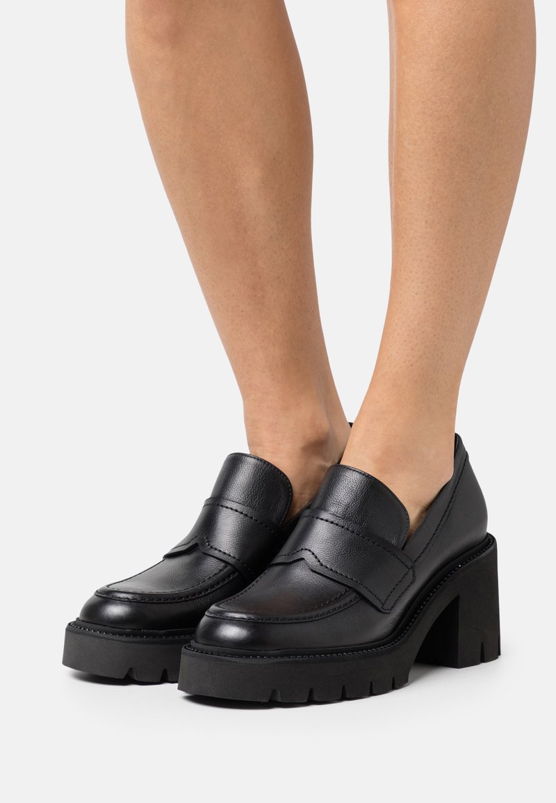 kennel schmenger high heels