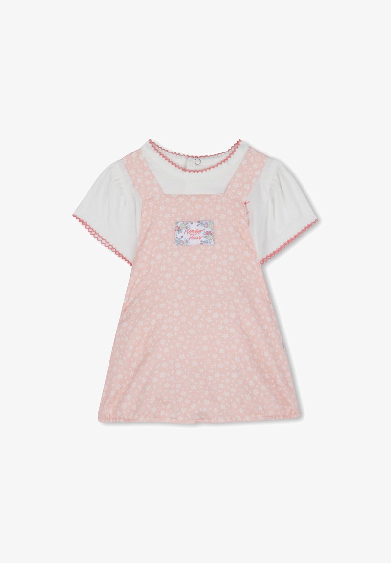 Robe rose avec un motif floral, manches blanches courtes et bords festonnés. Dotée d'un patch rectangulaire avec la marque "Kenzo Paris".