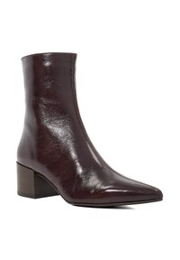 Burgundy leather ankle boot with a pointed toe, glossy texture, and a low block heel. Seamless design with no visible closures or decorations.