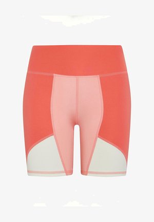 Pantalones cortos deportivos de color coral rosa con una cintura alta, diseño de paneles en bloque de color en tonos de rosa y blanco, y una textura suave.