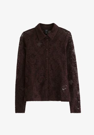 Camicetta bordeaux in pizzo con maniche lunghe, caratterizzata da un colletto, motivi floreali e una texture semi-trasparente.