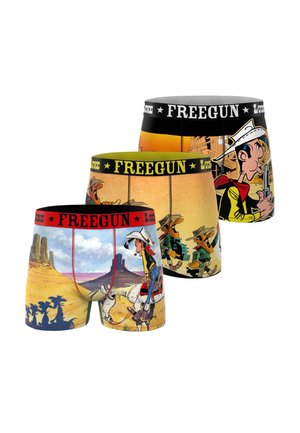 Trois boxers colorés avec des personnages de cow-boy dessin animé et des paysages désertiques, avec des ceintures de marque "FREEGUN" en rouge, jaune et noir.